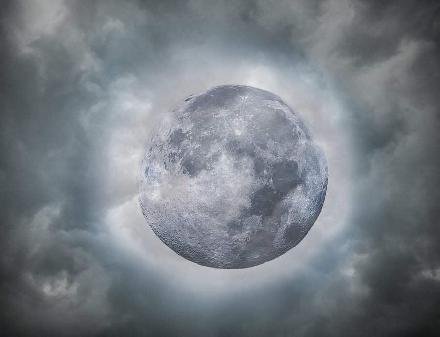A silver full Moon by Caleb Carone