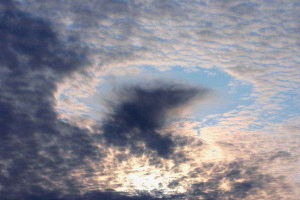 Mysterious UFO-Shaped Cloud Holes Explained