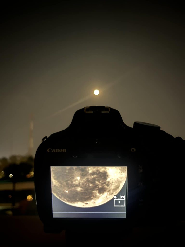 Moon Through Photographer's Lens