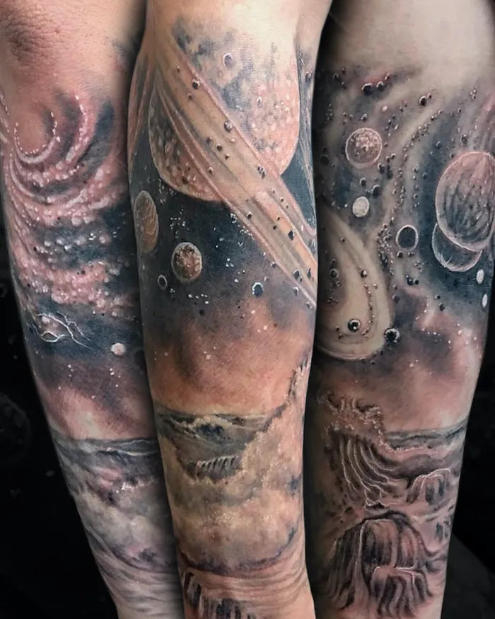 black and grey space tattoo